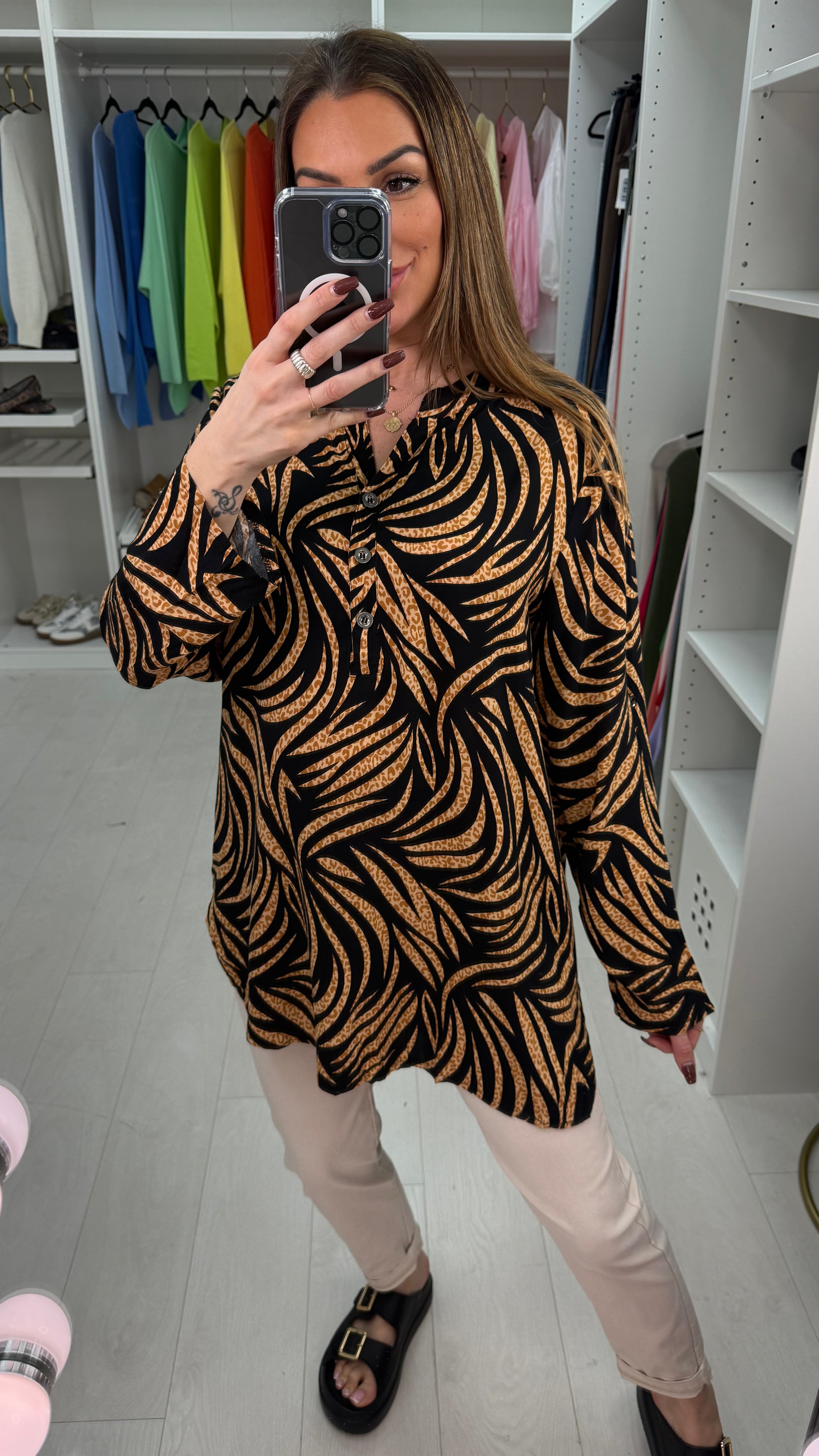 Senita Dipped Hem V Neck Blouse