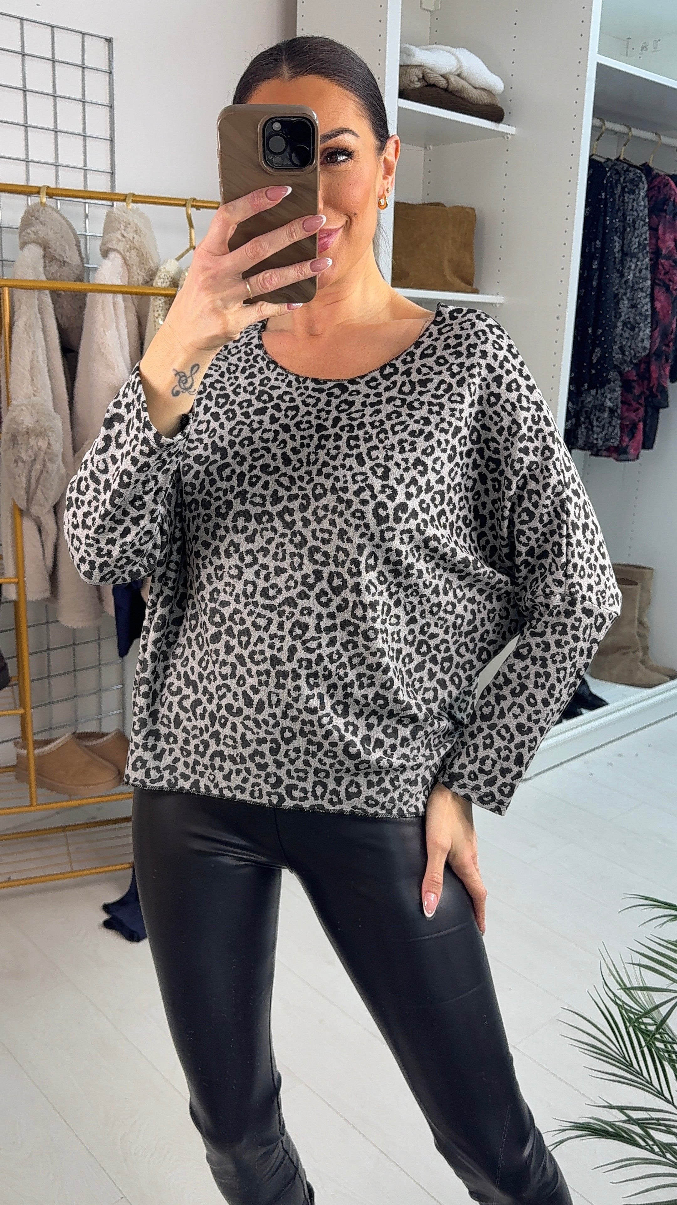 Dallas Cheetah Print Dip Hem Top