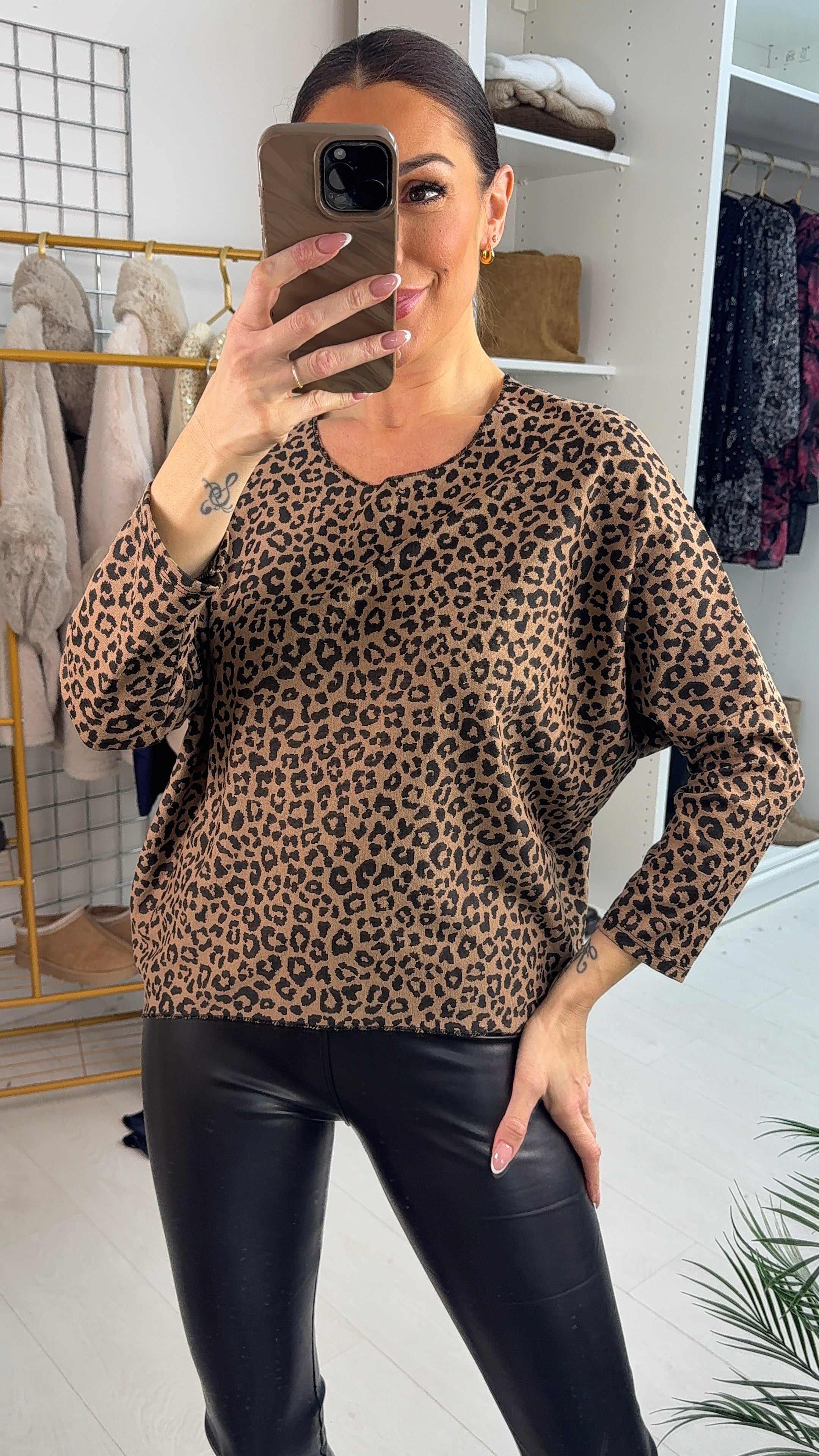 Dallas Cheetah Print Dip Hem Top