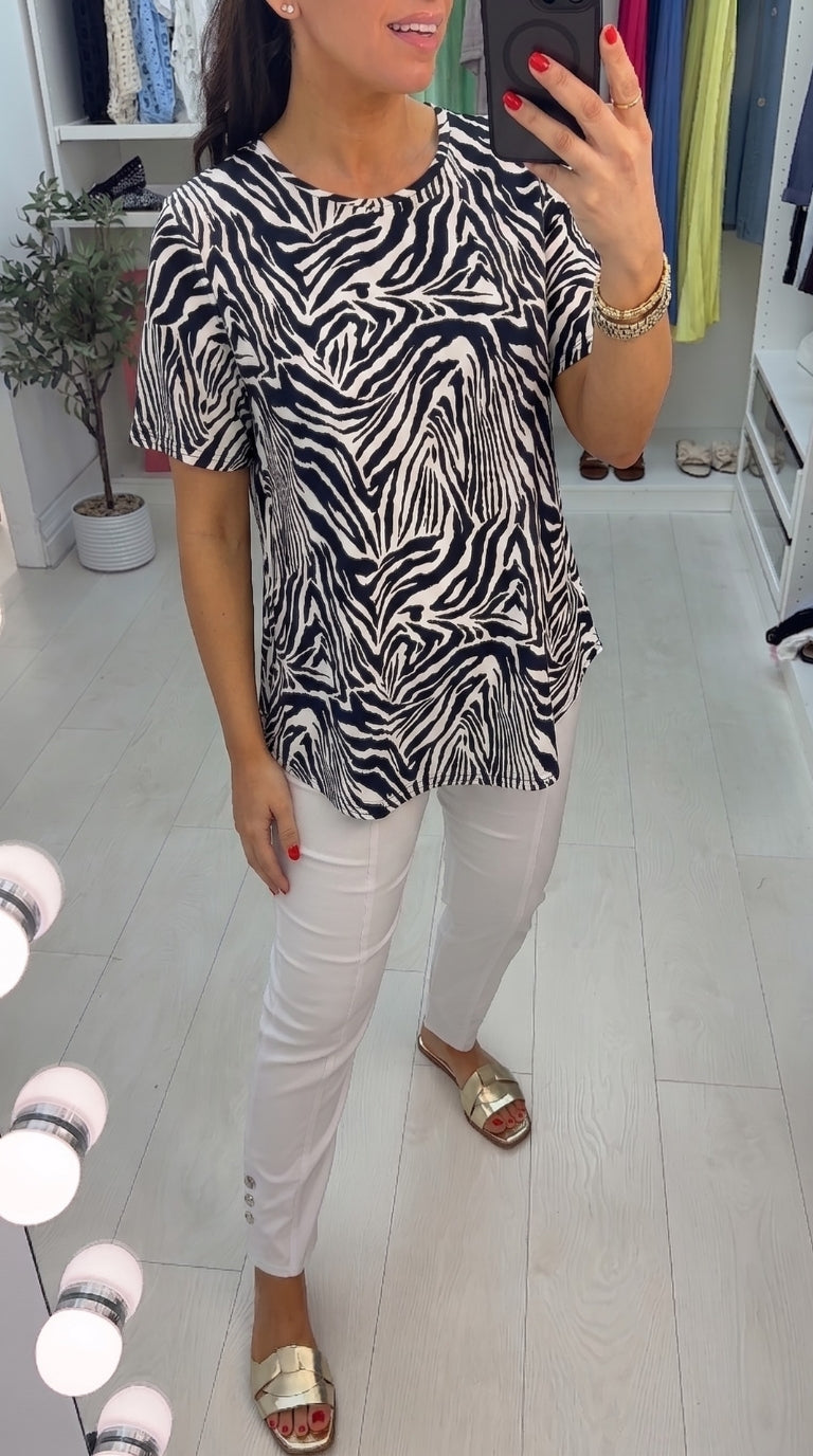 Gigi Zebra Print Dip Hem Top