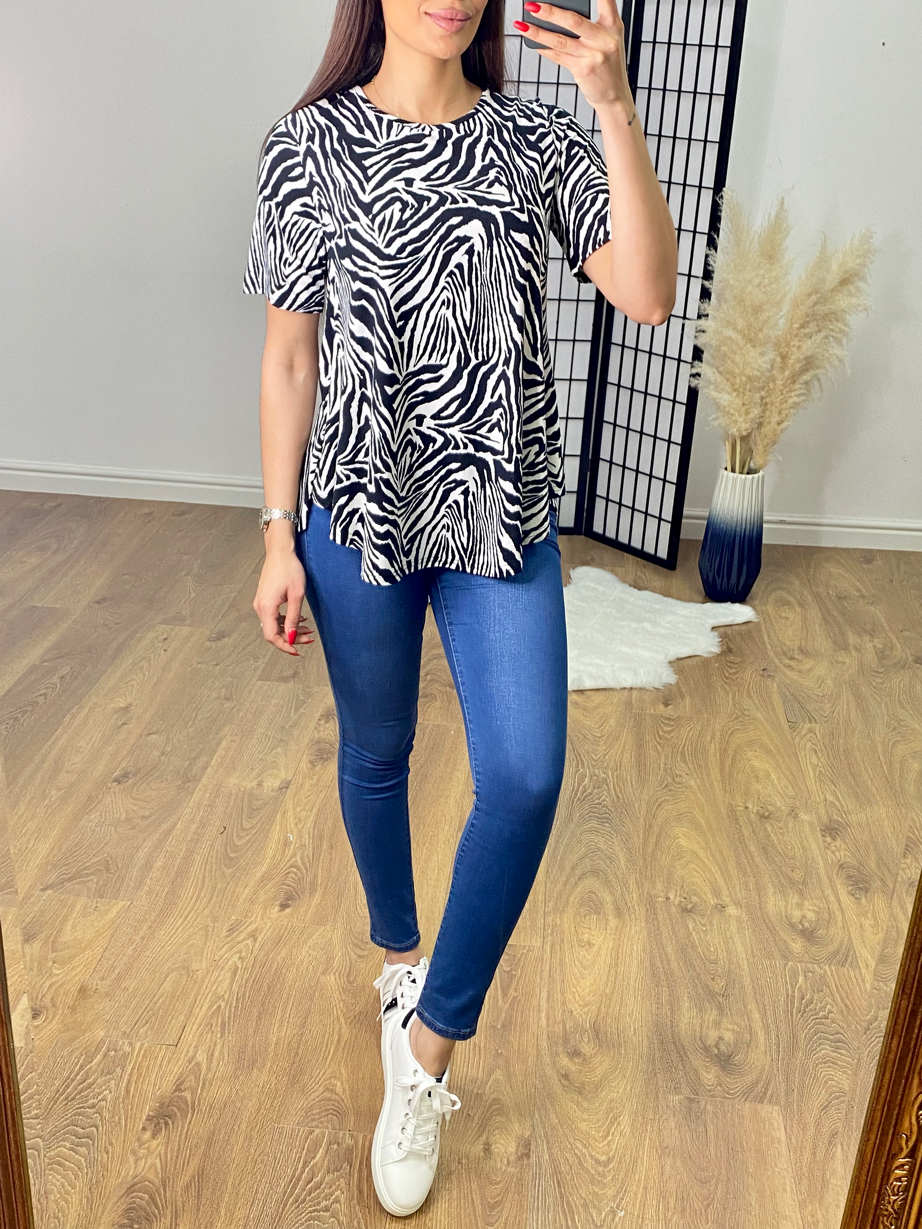 Gigi Zebra Print Dip Hem Top