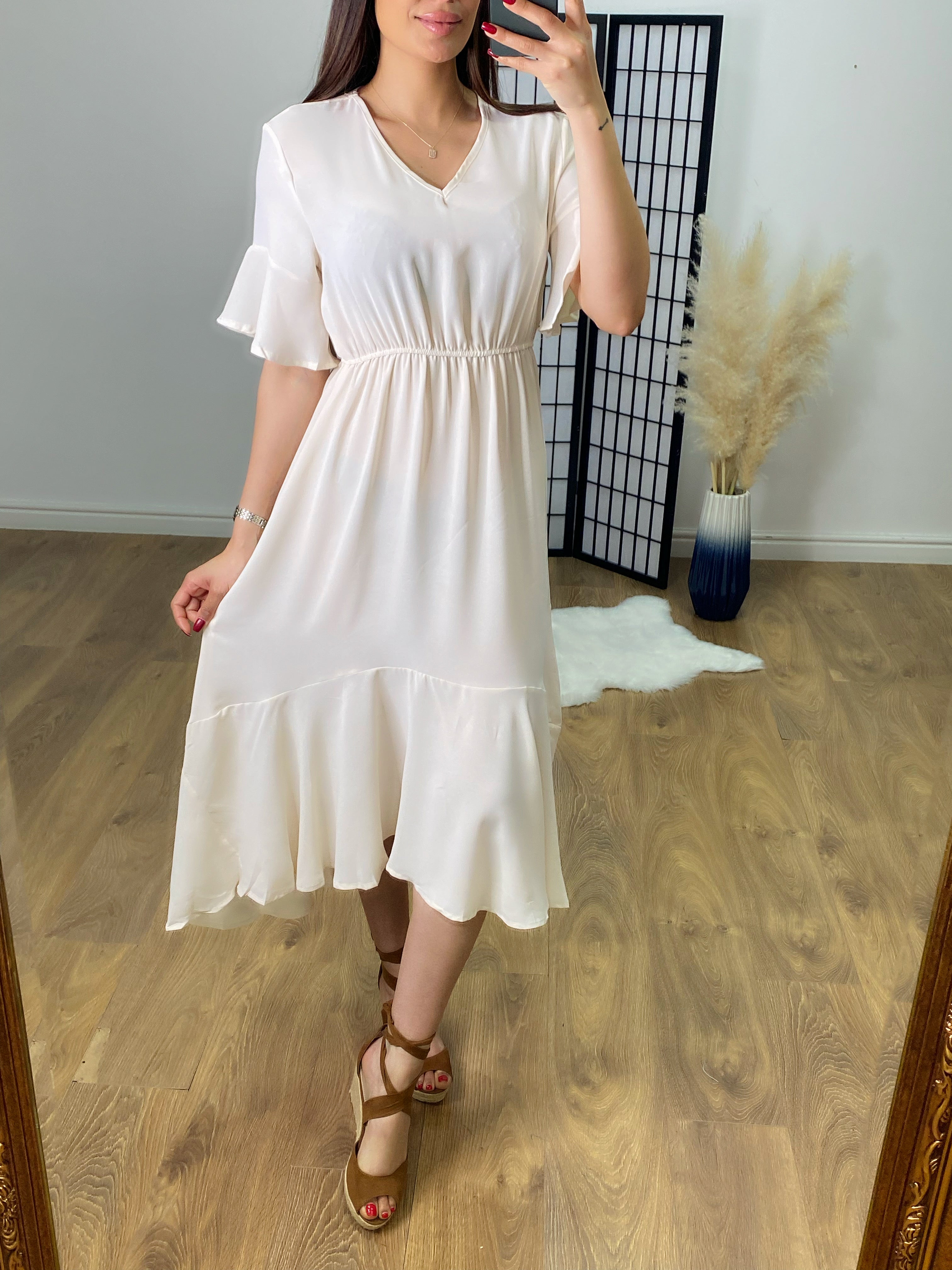 Alley Ruffle Dip Hem Dress