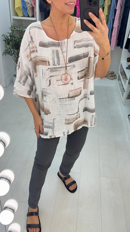 Ivona Abstract Print Necklace Dipped Hem Top