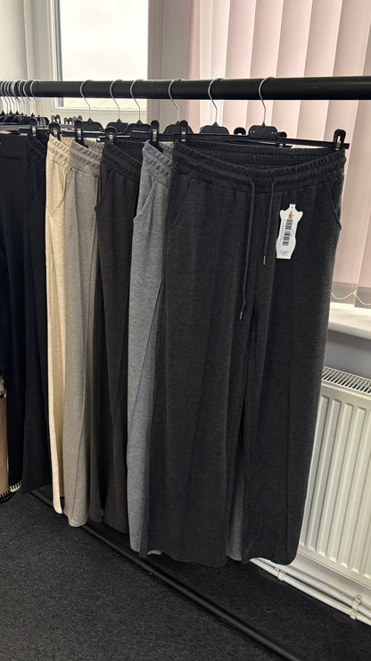 Yara Exposed Seam Drawstring Waist Wide Leg Trousers