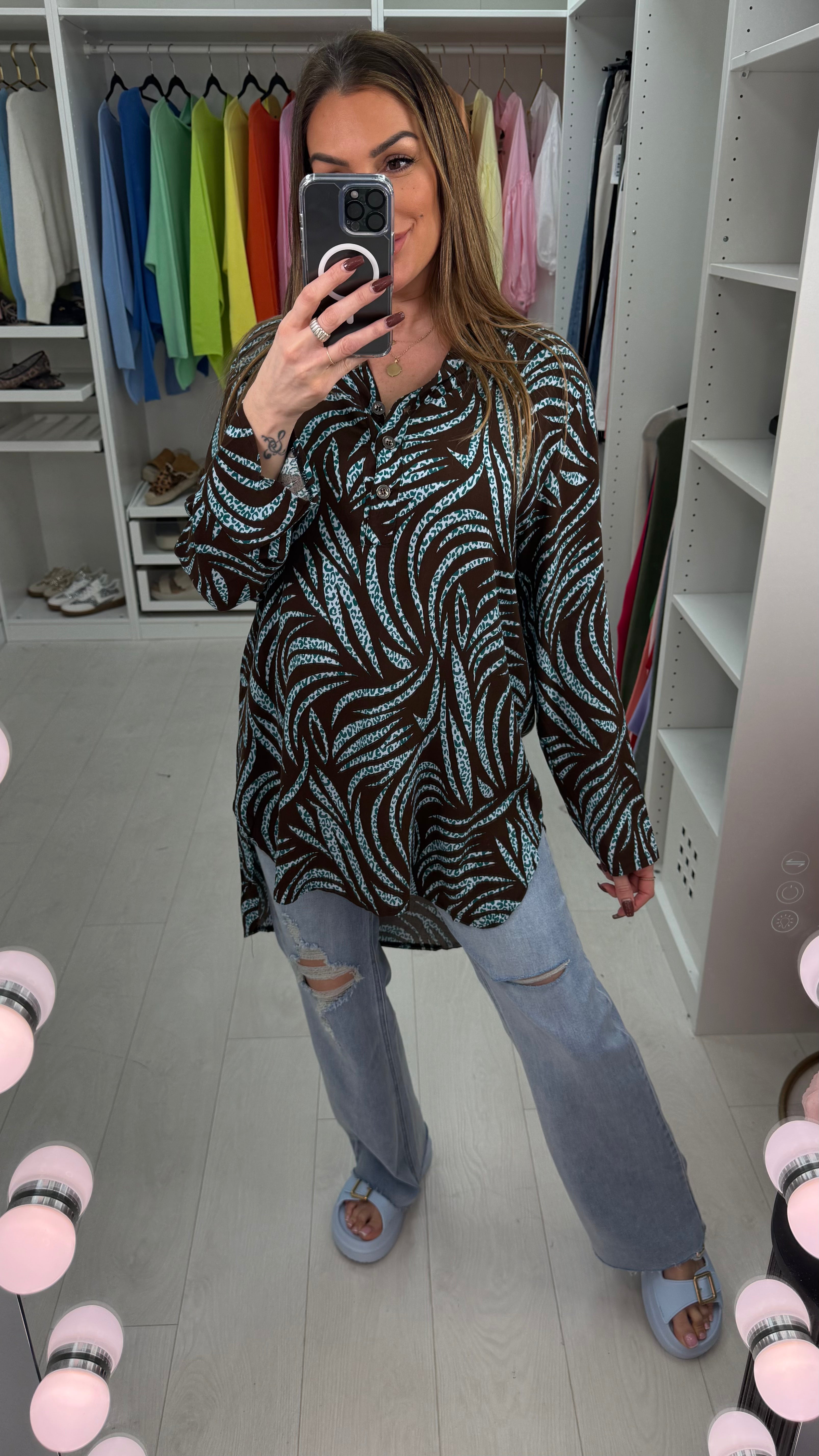 Senita Dipped Hem V Neck Blouse