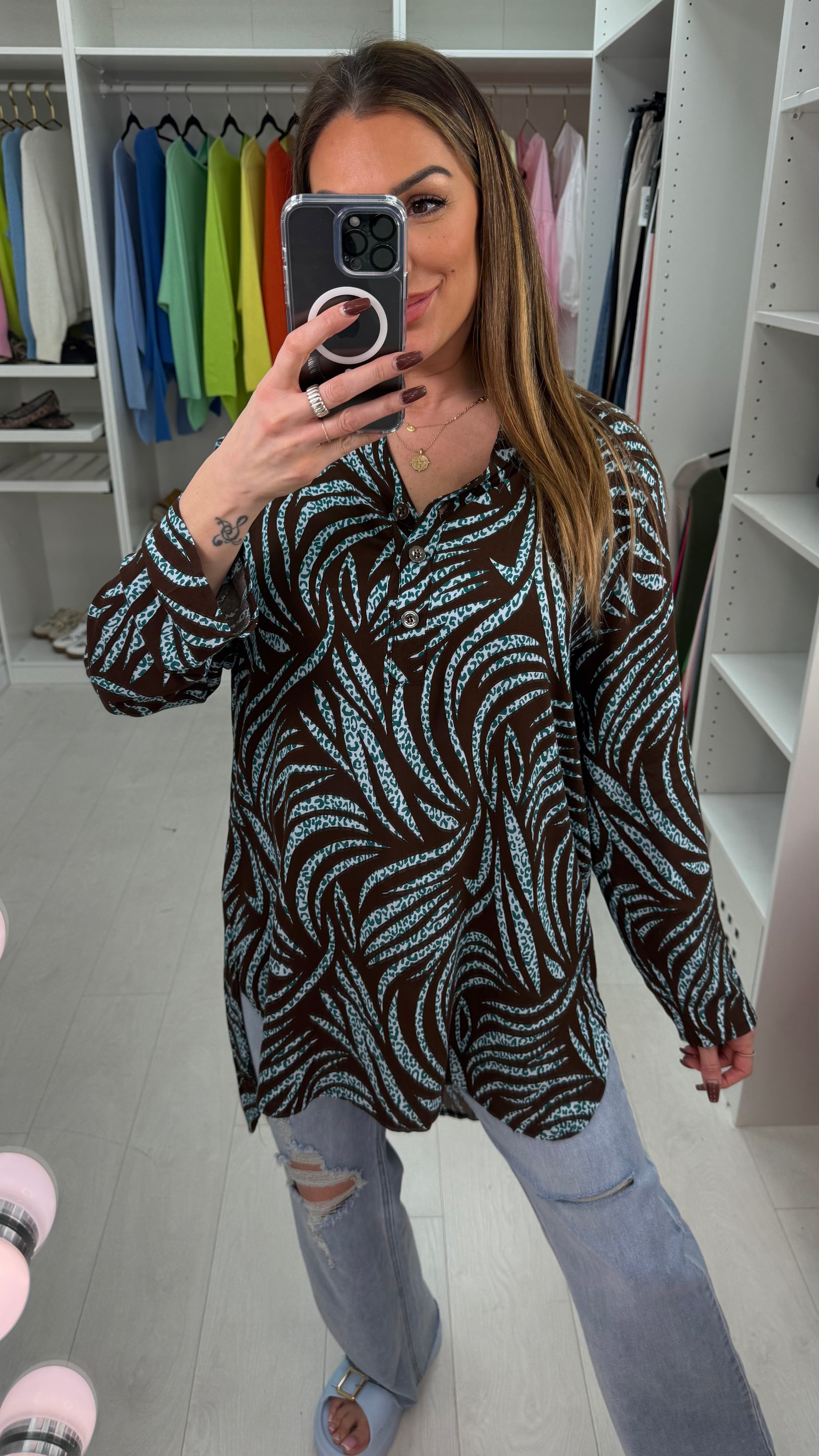 Senita Dipped Hem V Neck Blouse