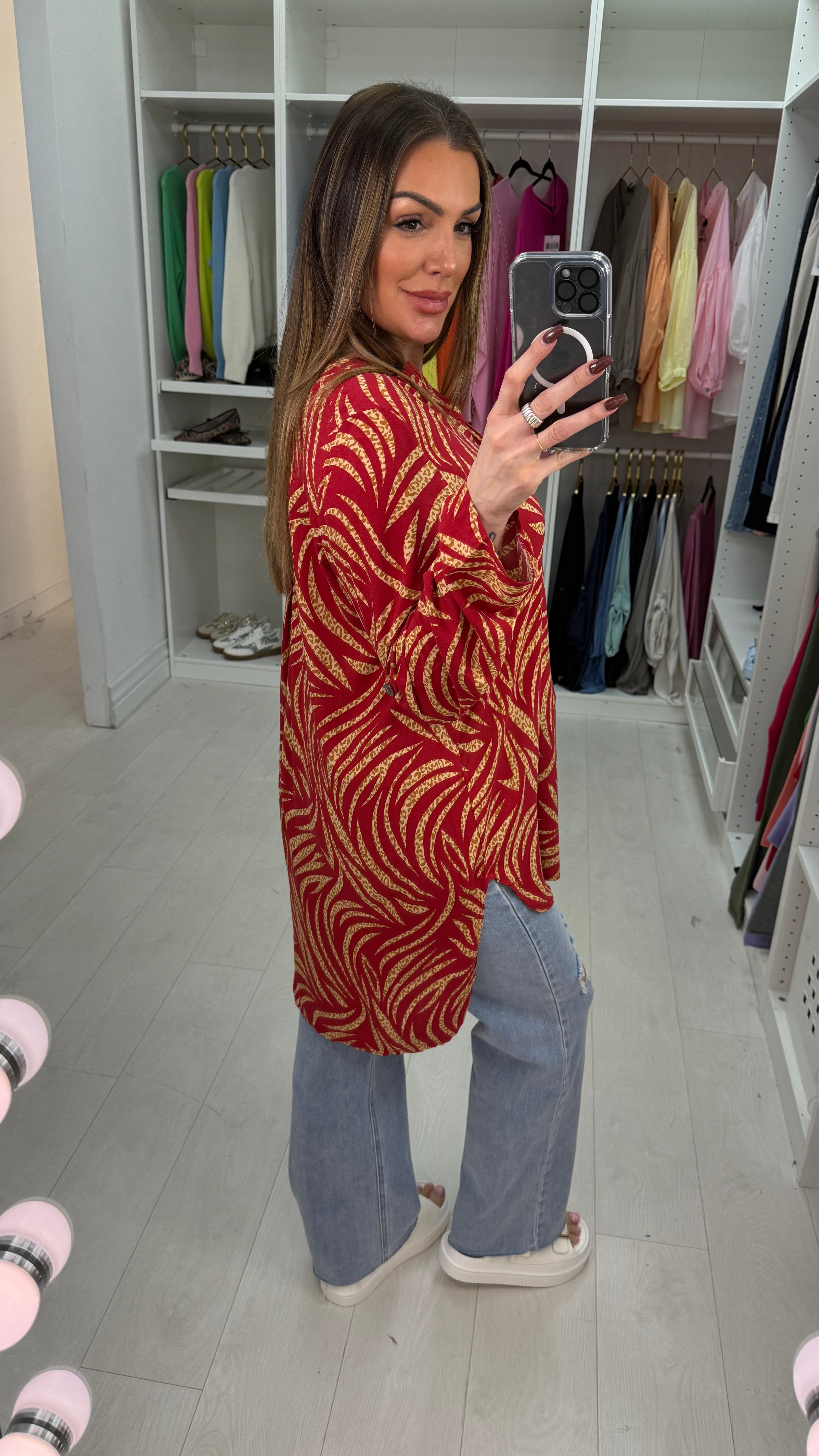 Senita Dipped Hem V Neck Blouse