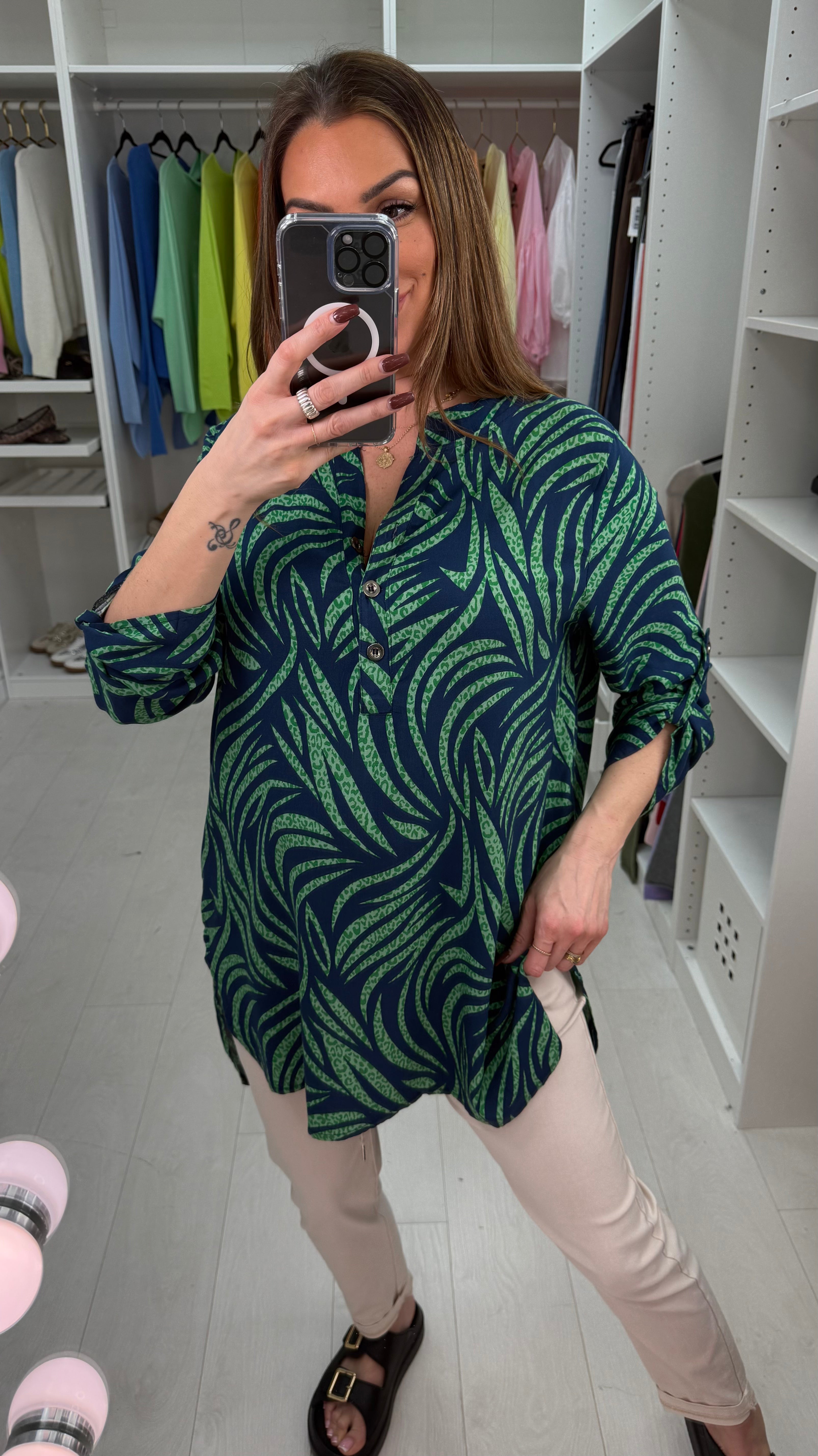 Senita Dipped Hem V Neck Blouse