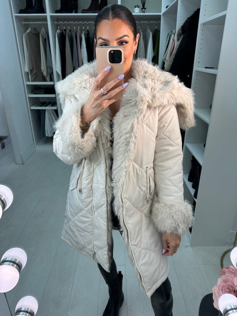 Cream parka with fur hood on sale