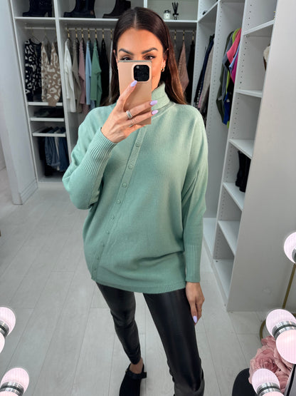 Selda Asymmetric Button Detailed Roll Neck Knit Jumper