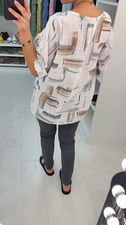 Ivona Abstract Print Necklace Dipped Hem Top