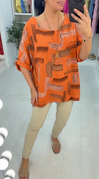 Ivona Abstract Print Necklace Dipped Hem Top