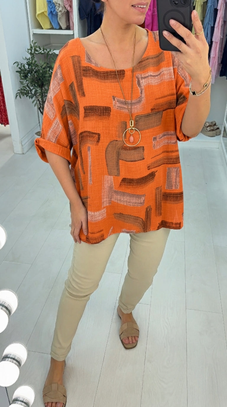 Ivona Abstract Print Necklace Dipped Hem Top