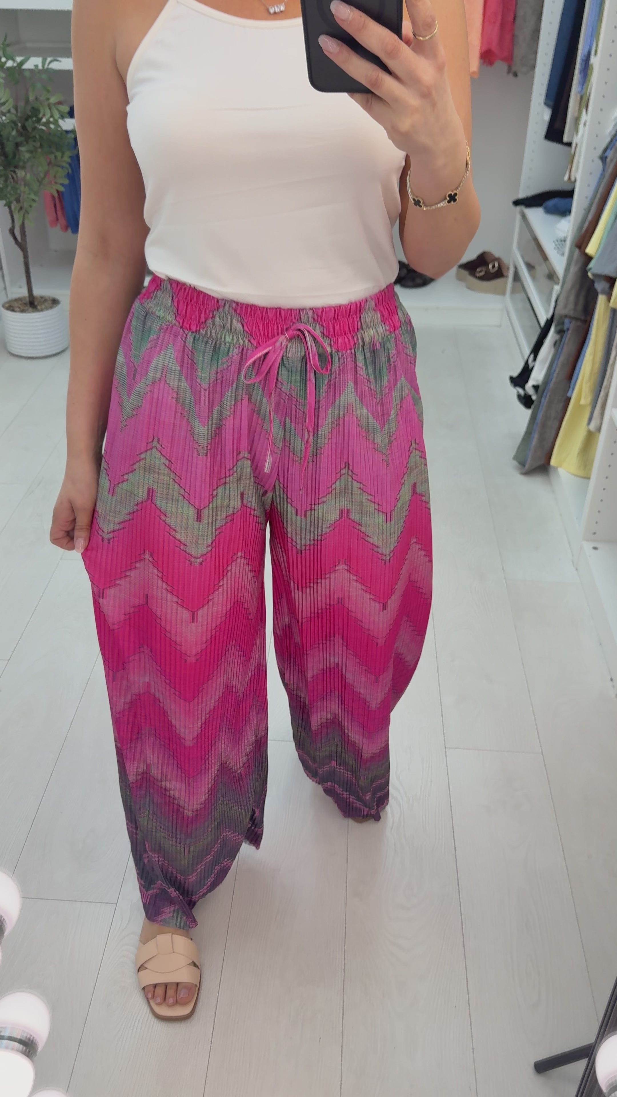 Load video: Rylie Abstract Print Pleated Wide Leg Trousers