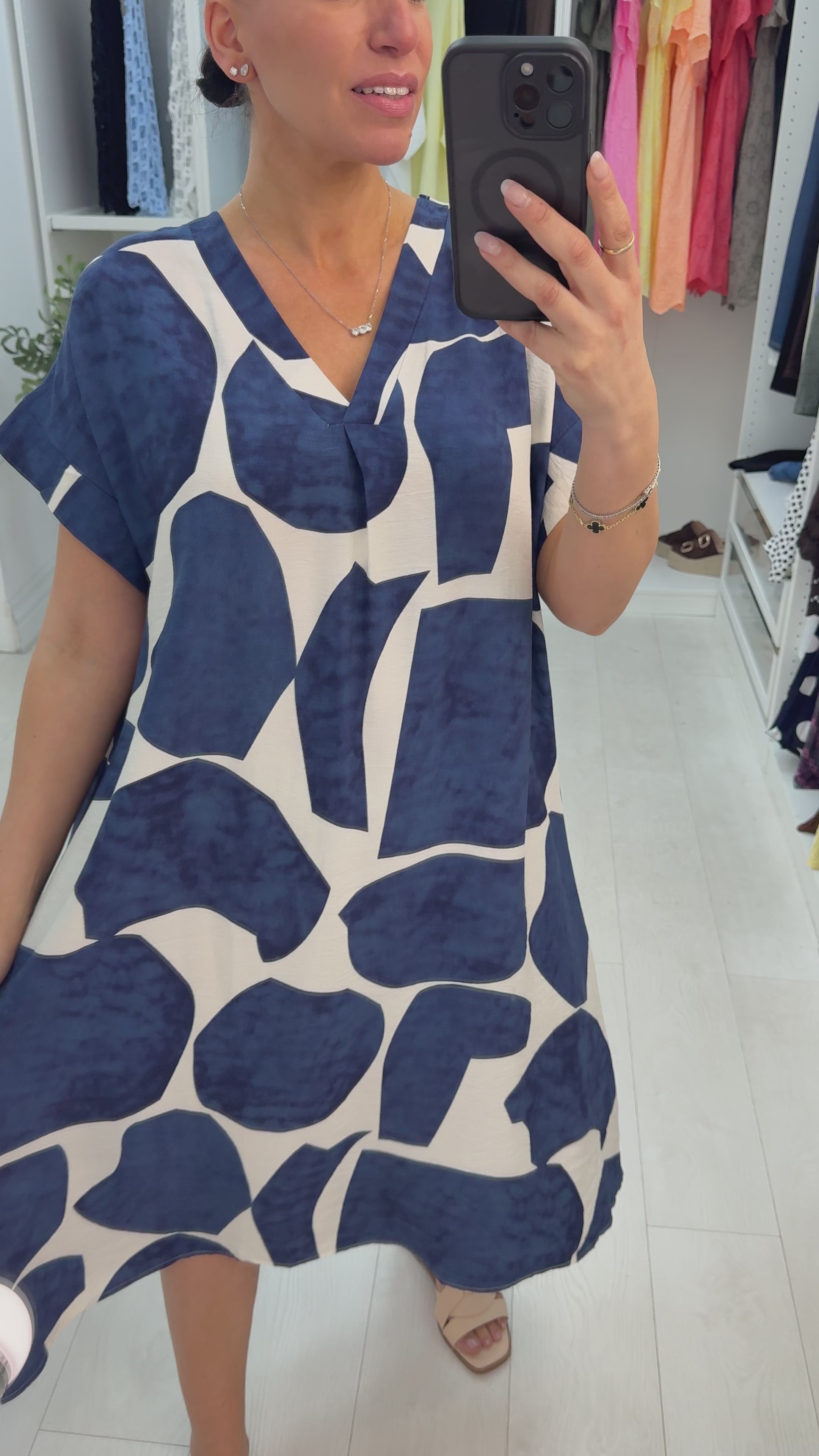 Load video: Veronia Abstract Print V Neck Loose Fit Dress