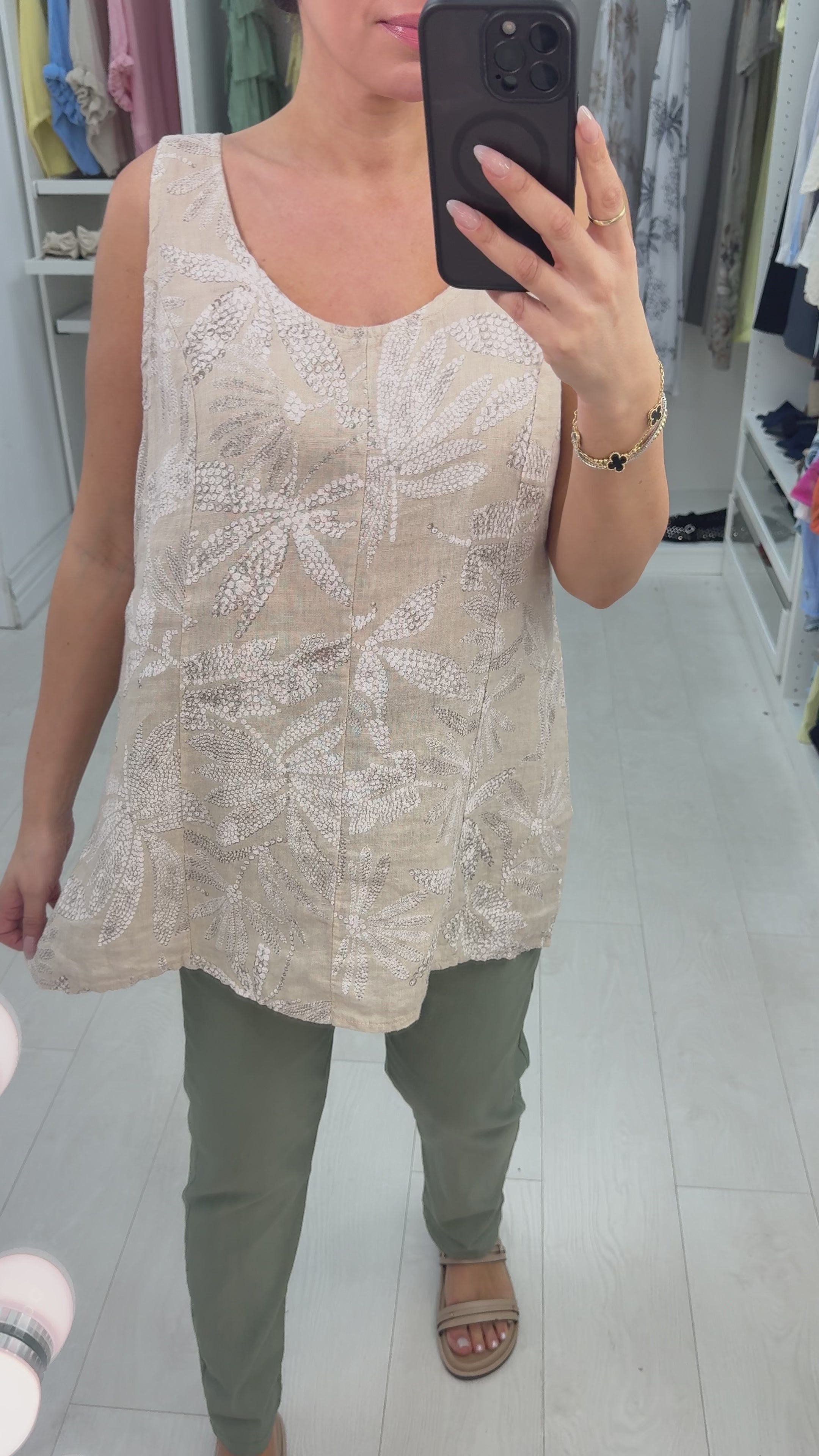 Load video: Nickie Floral Print Dipped Hem Linen Top