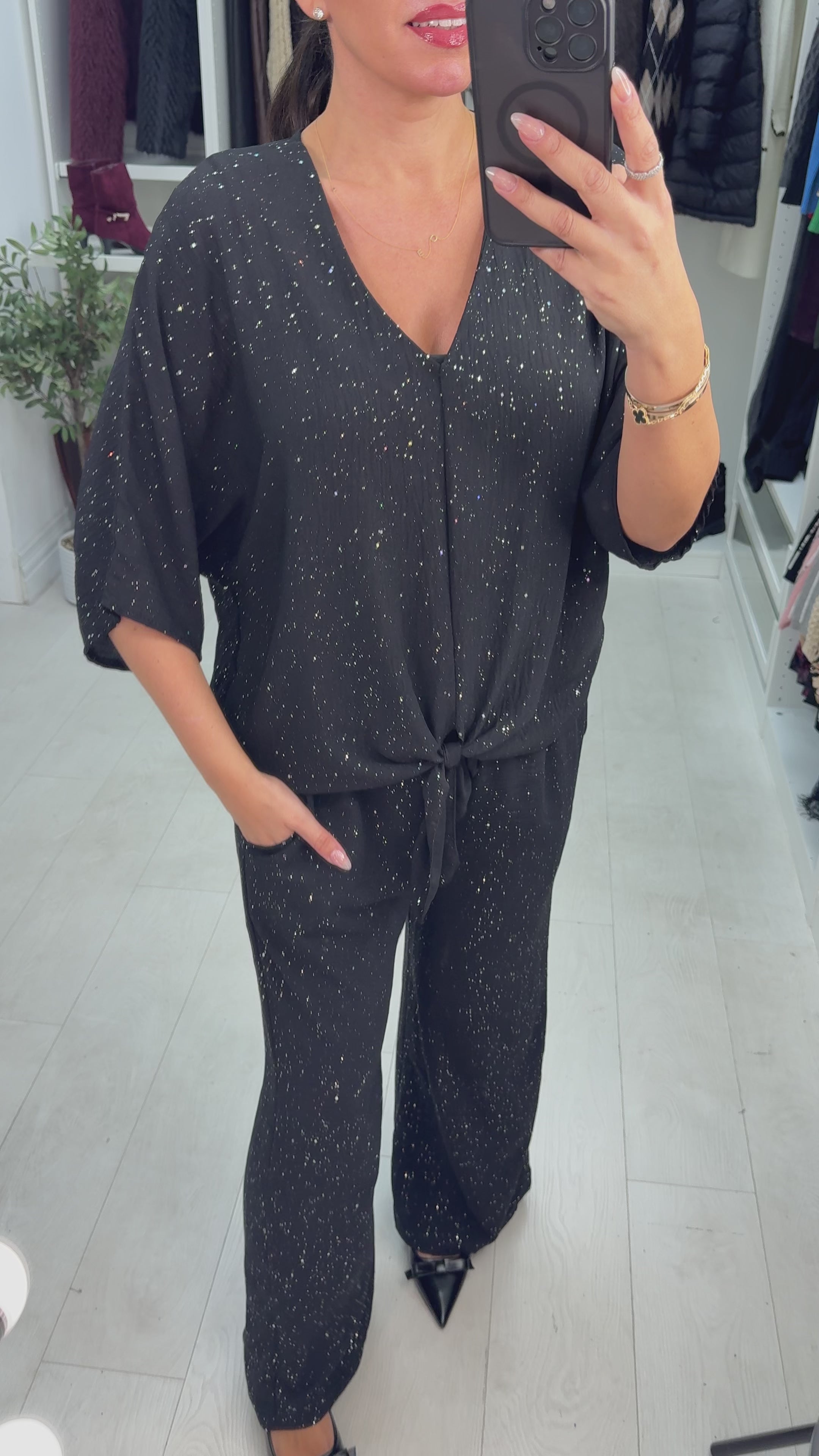 Load video: Cecillia Tie Front V Neck Sparkle Top