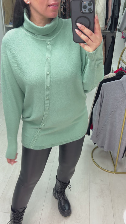 Selda Asymmetric Button Detailed Roll Neck Knit Jumper