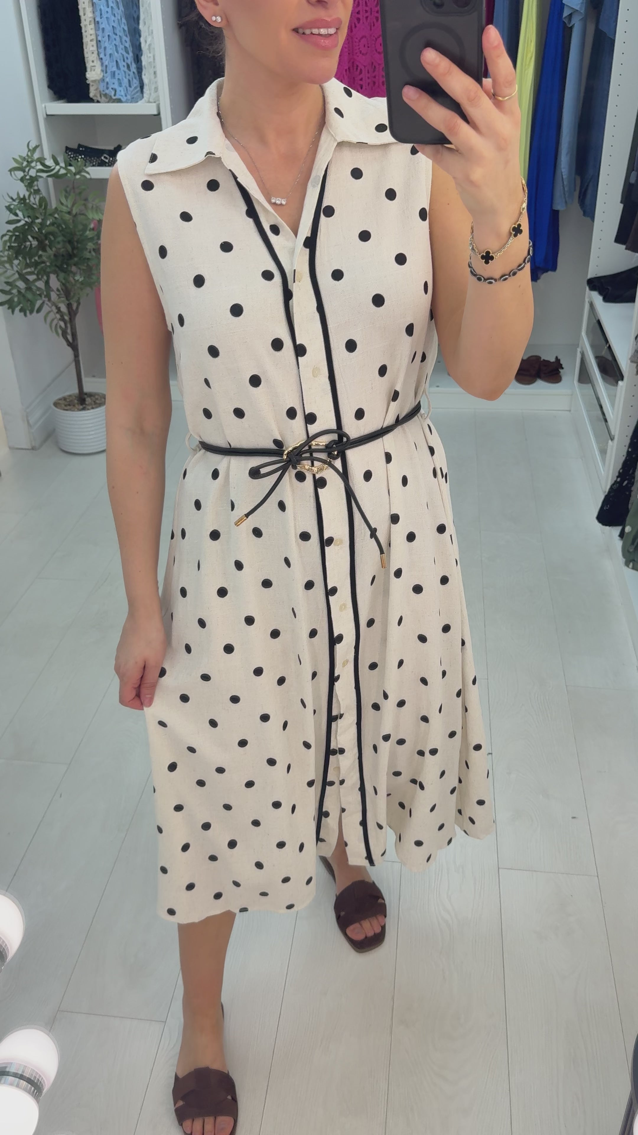 Load video: Wrenly Polka Dot Sleeveless Belted Midi Dress