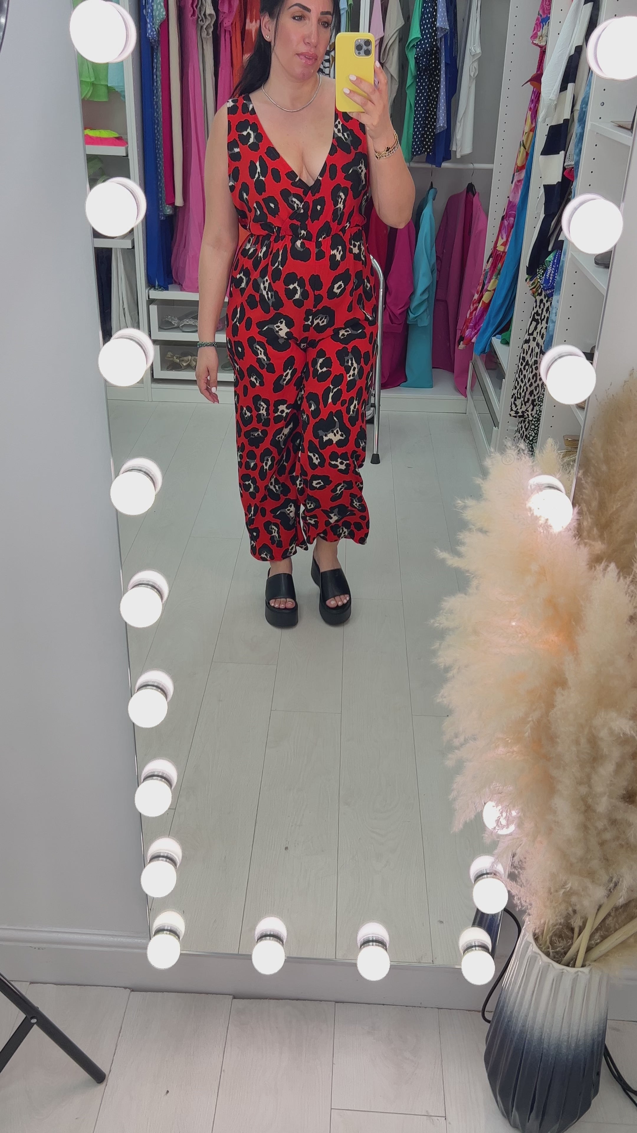 Load video: Linnea Red Animal Print Wrap Front Wide Leg Jumpsuit