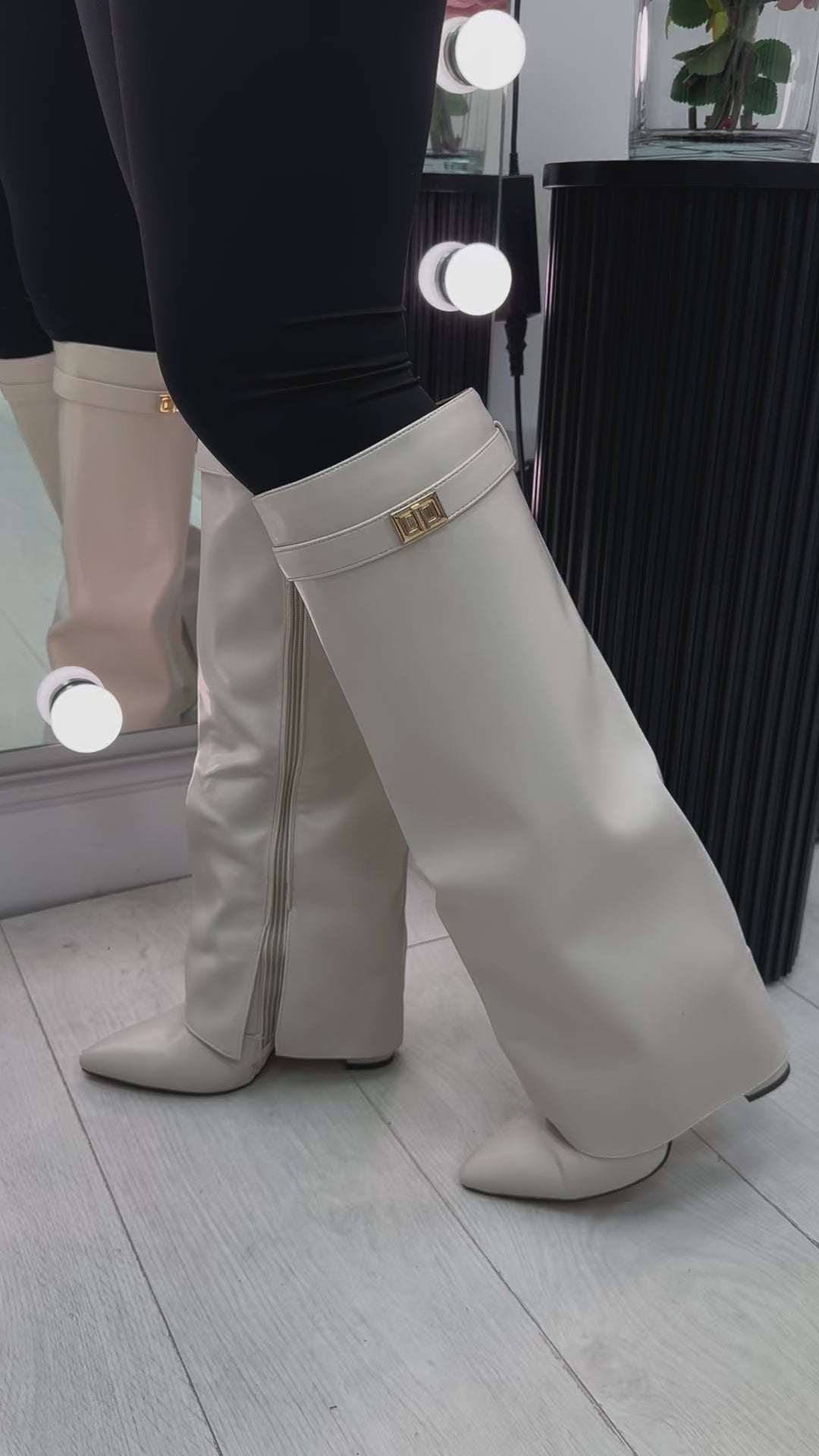 Load video: Anya Lock Detail Knee High Heeled Boot