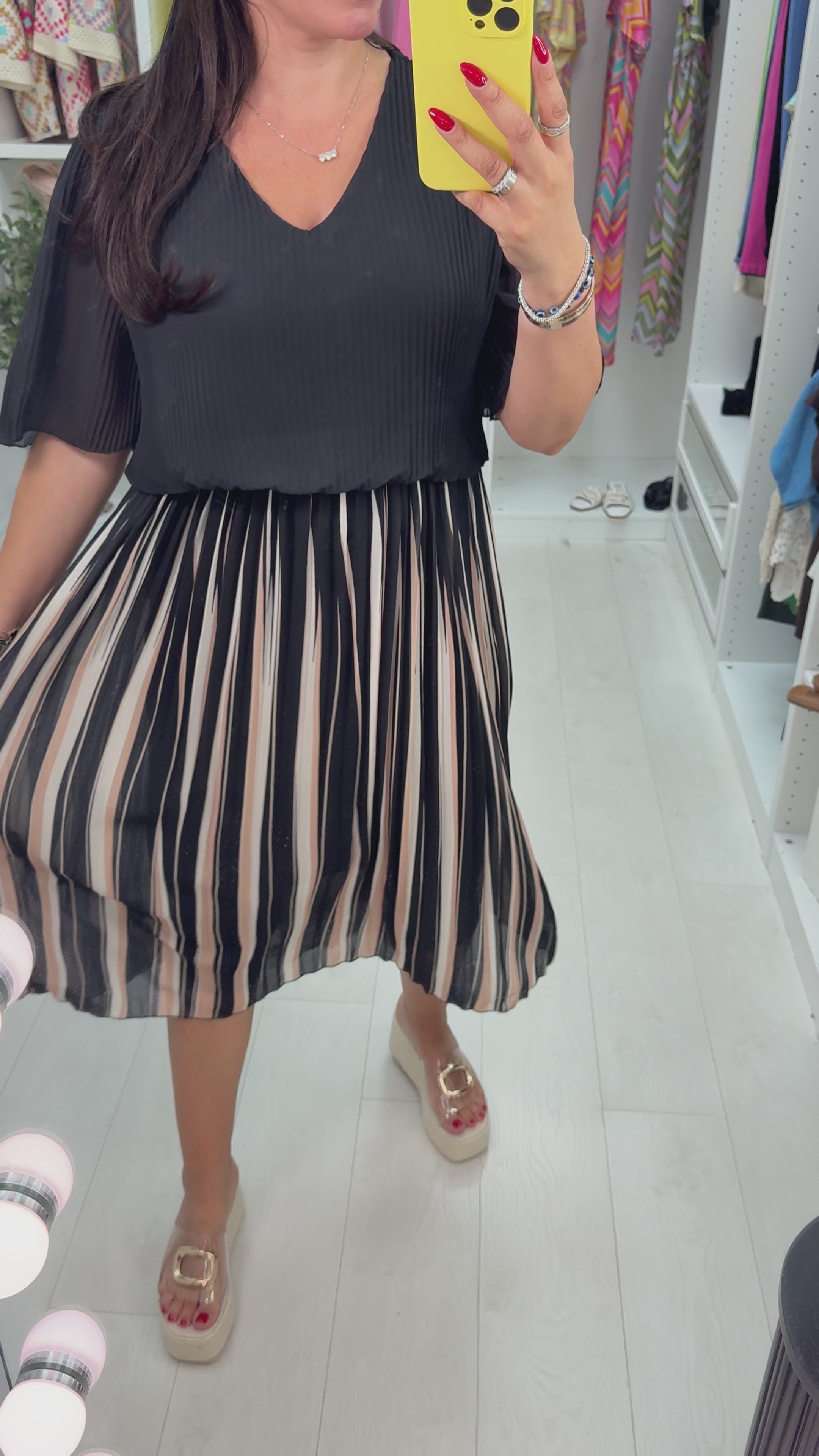 Load video: Rachella Striped Pleated Loose Fit Midi Dress