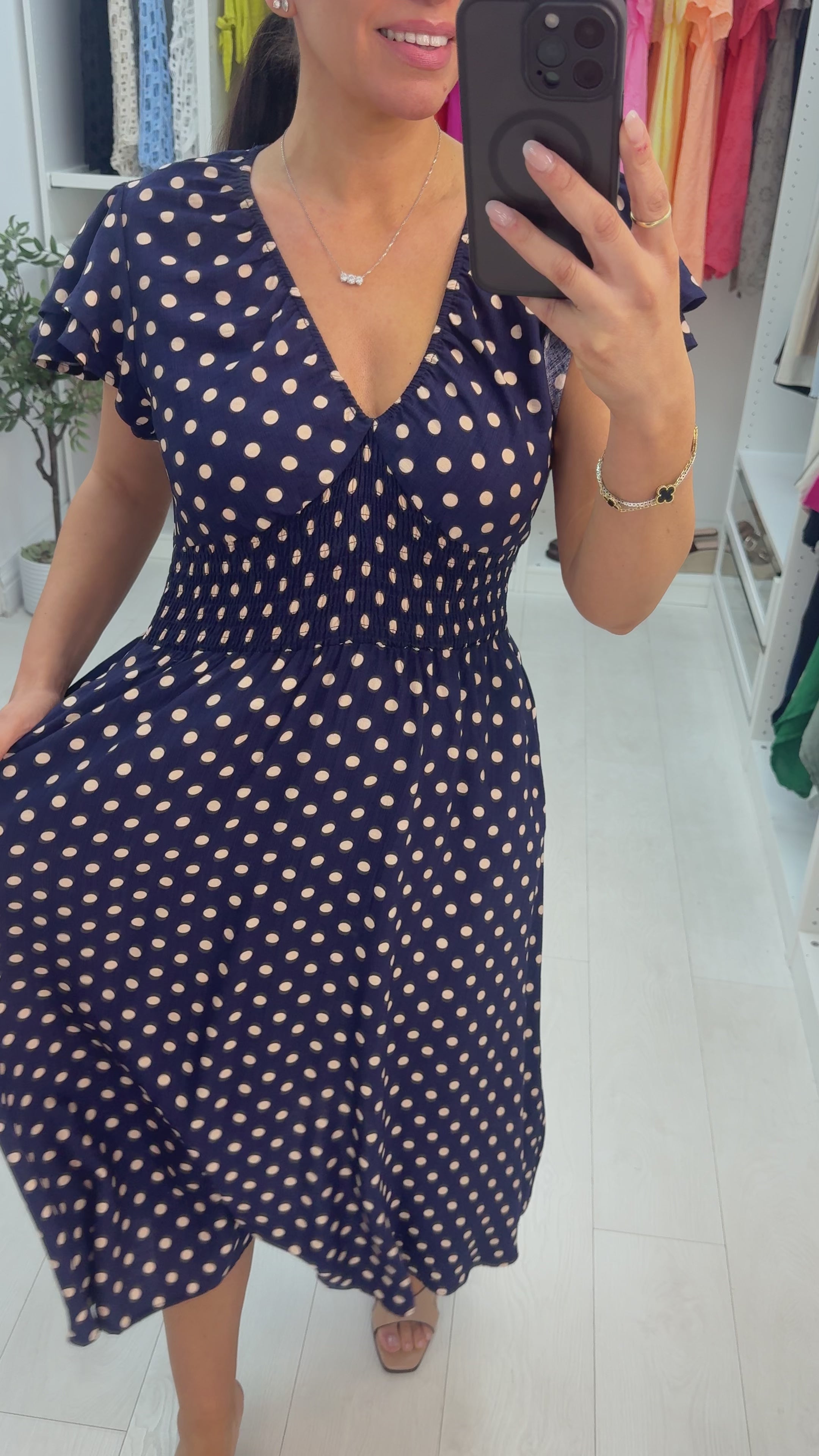 Load video: Cayla Polka Dot V Neck Shirred Waist Dress