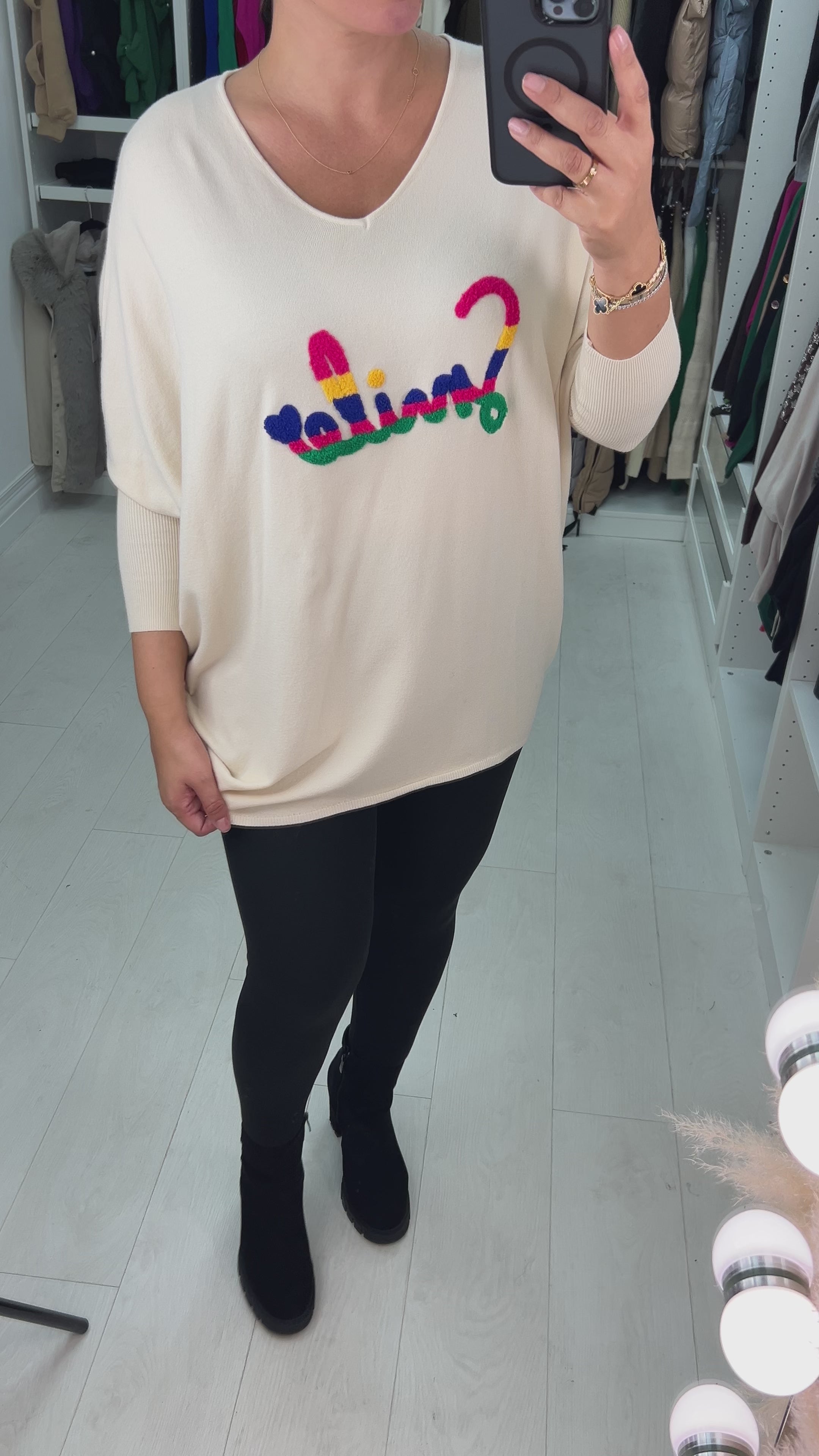 Load video: Zina Cream Colourful Smile Slogan Jumper