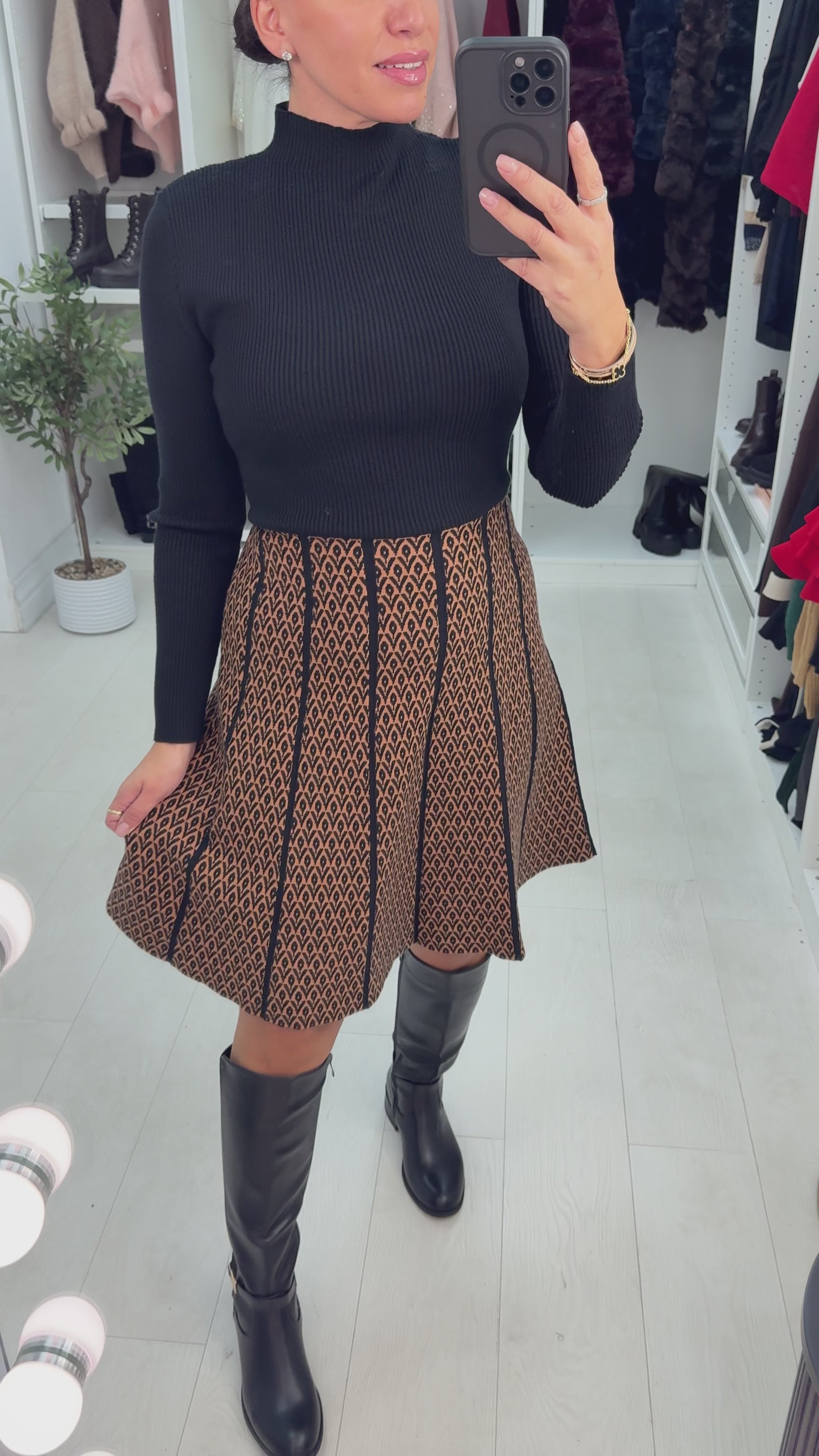 Load video: Bettie Pleated Midi Skater Dress