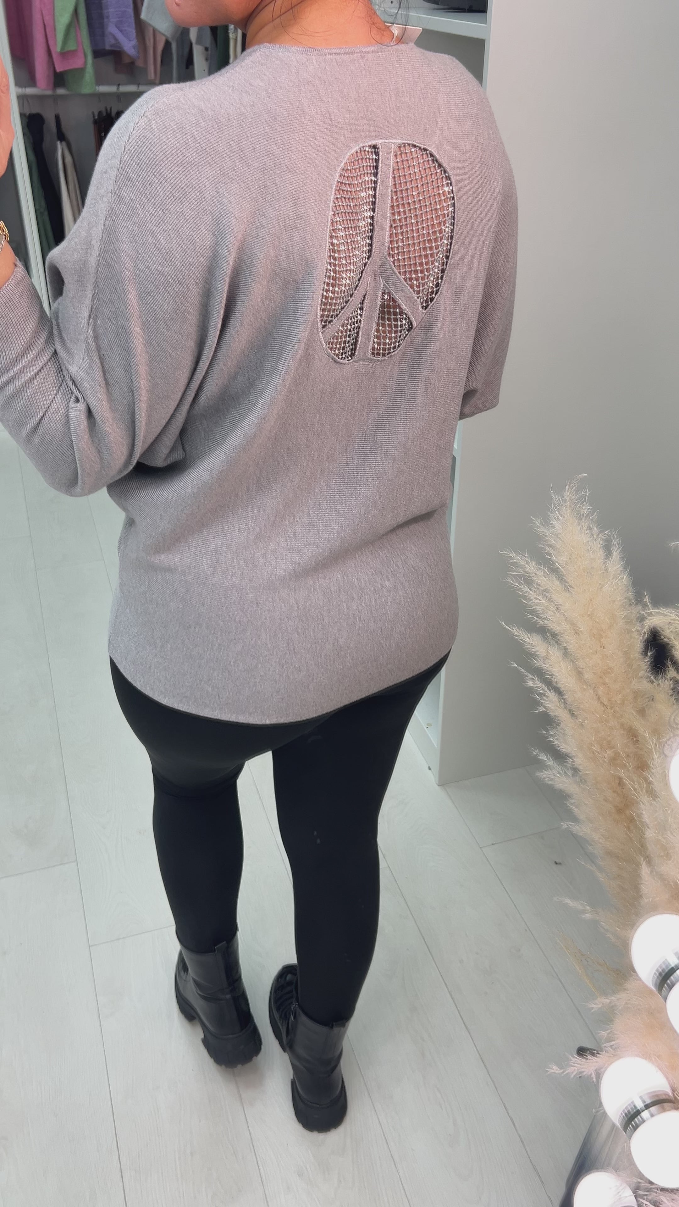 Load video: Arch Diamante Peace Sign Ribbed  Jumper
