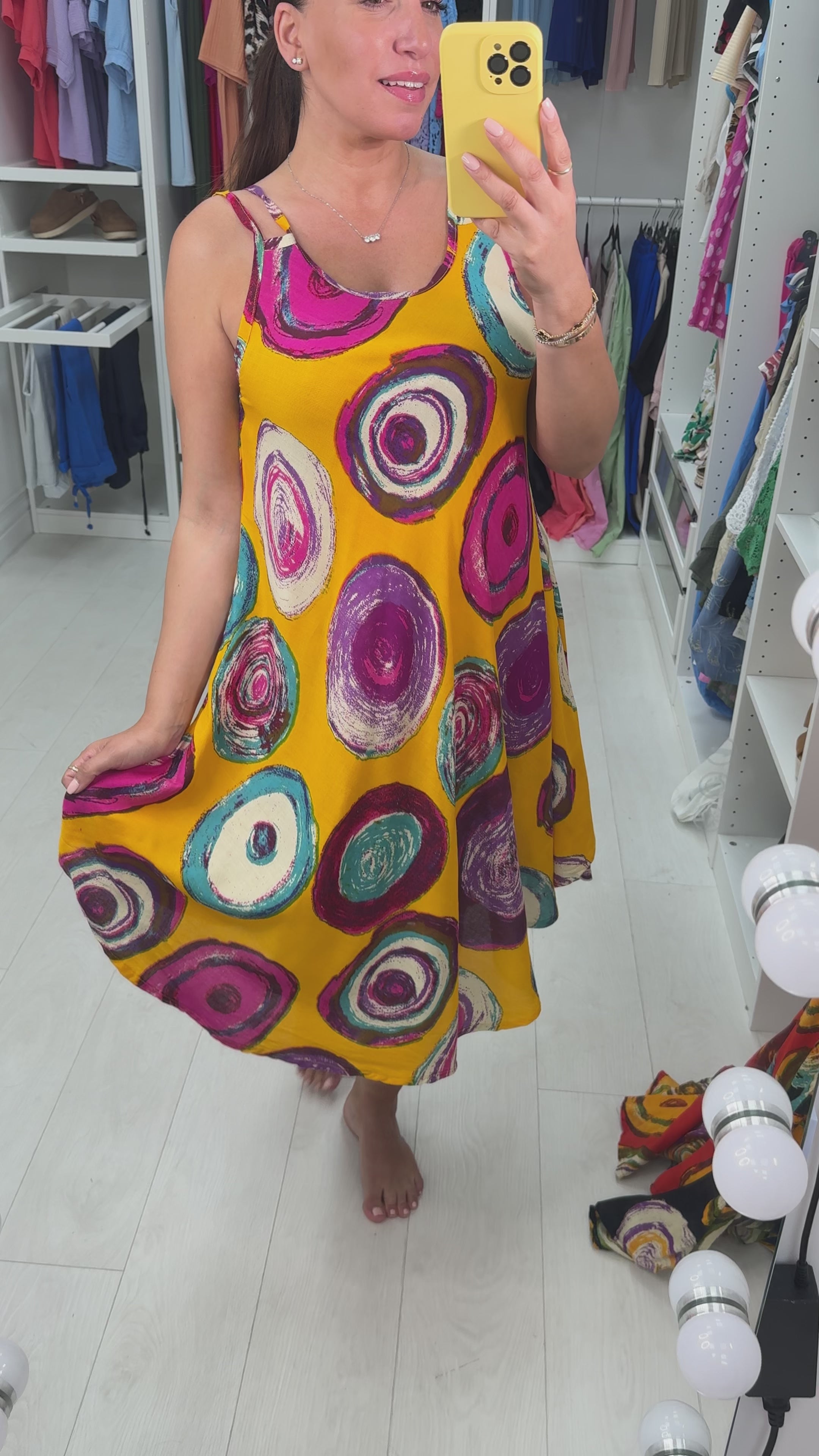 Load video: Benedita Abstract Circle Print Midi Dress
