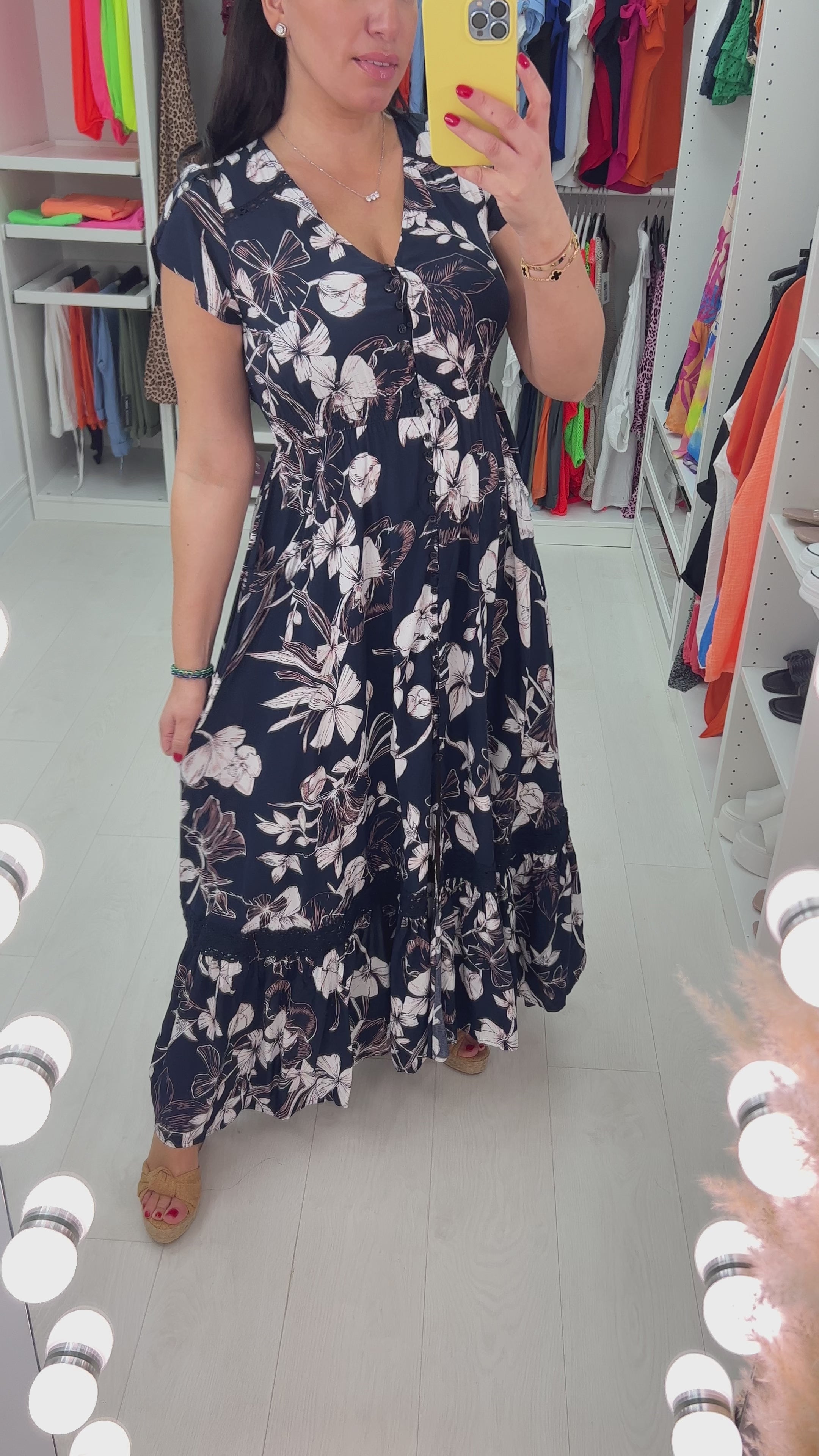 Load video: Sparta Navy Floral Ruffle Hem Maxi Dress