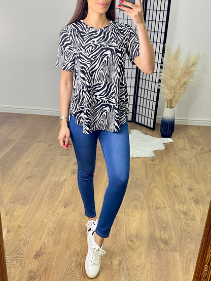 Gigi Zebra Print Dip Hem Top