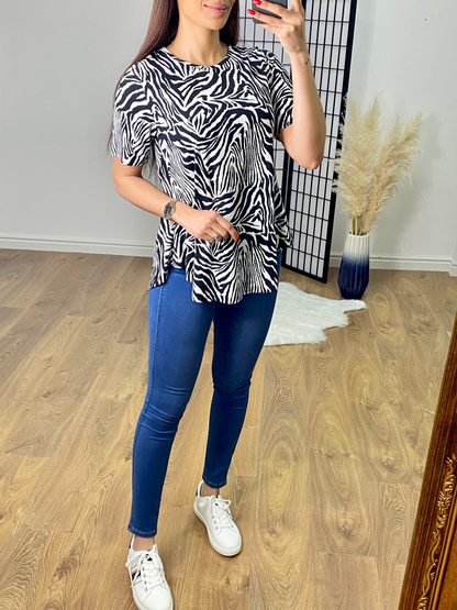 Gigi Zebra Print Dip Hem Top