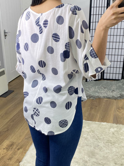Berlin White Circle Print Dipped Hem Blouse